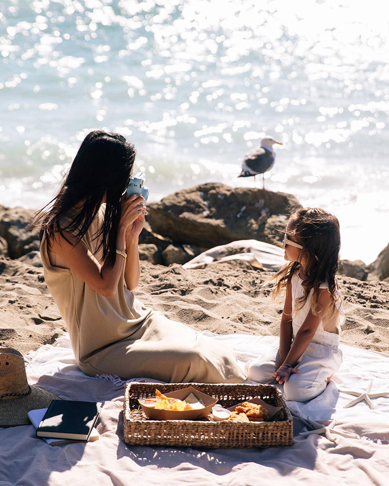 Mother and daughter at the beach.