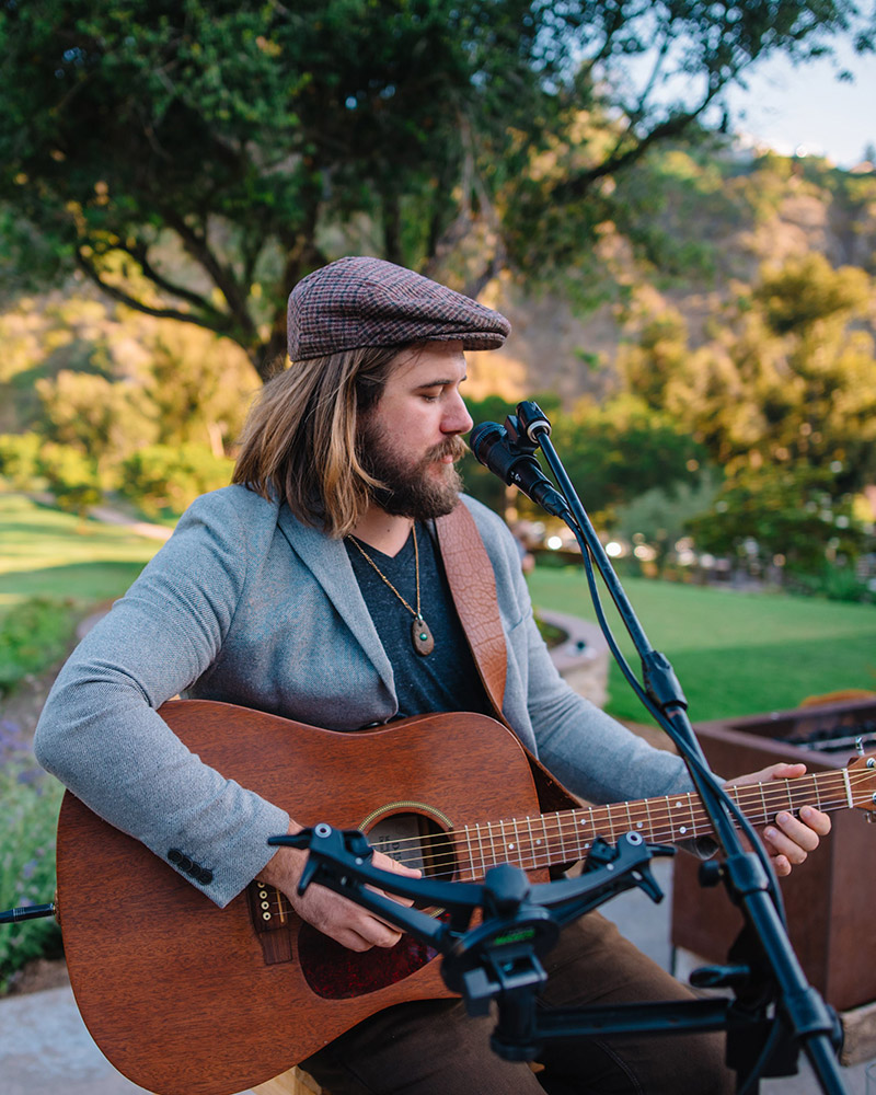 Musician playing a guitar. 