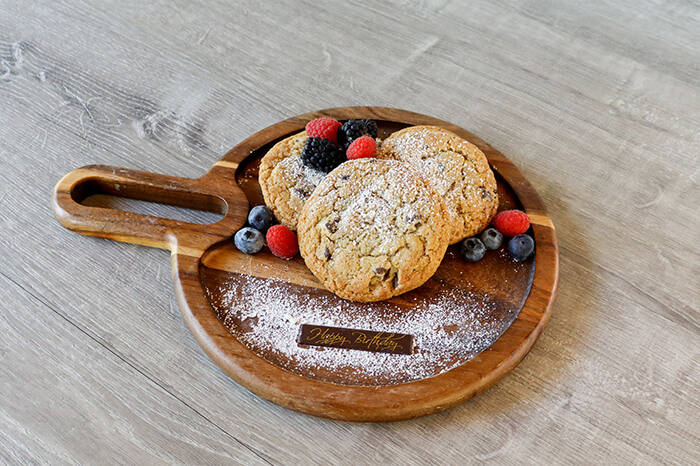 Cookies and Fruit on a cutting board