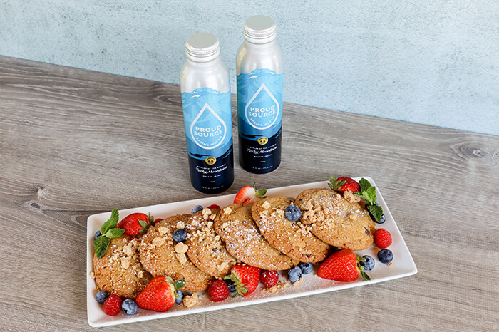 Cookies and fruit plate with reusable water bottles 